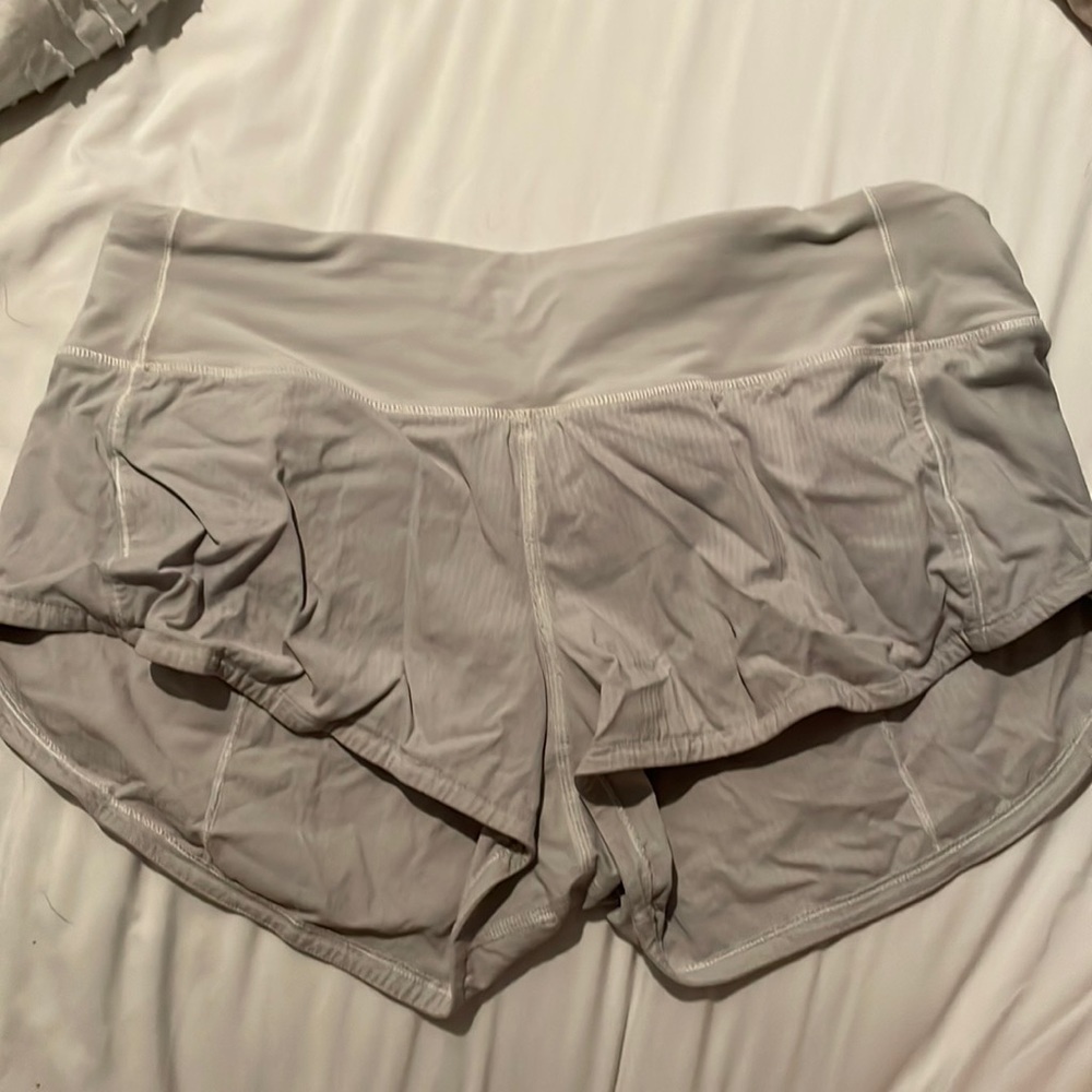 Lululemon size 4 speed ups color white but stained gray.